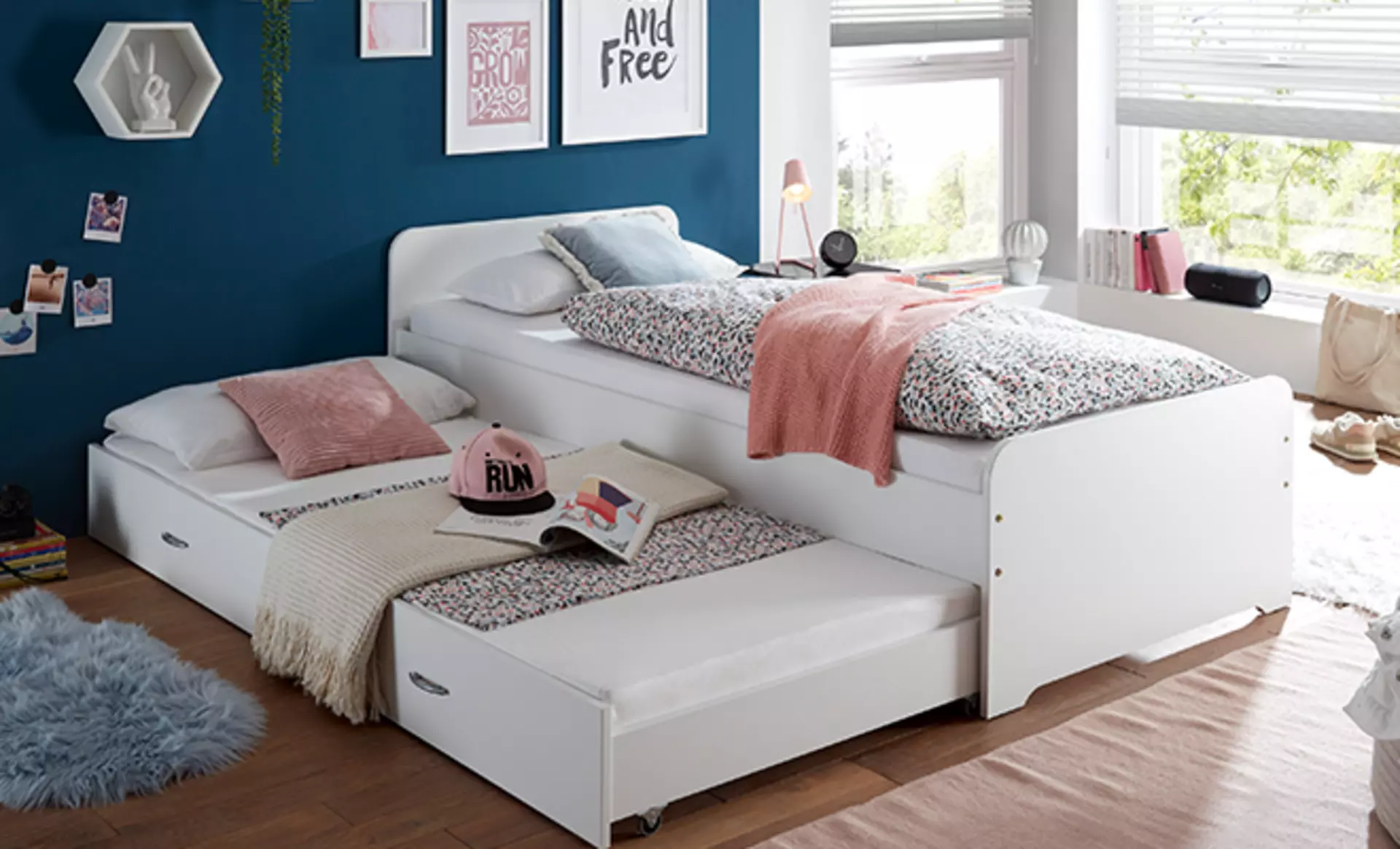 Kinderbett mit zusätzlicher ausziehbarer Matratze