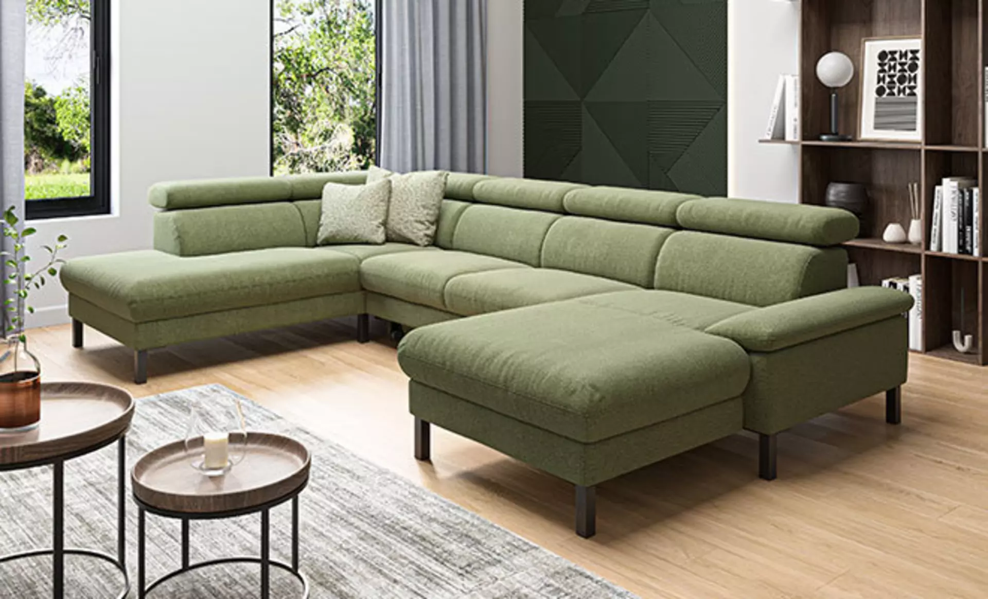Ein Sofa in der Farbe Matcha Grün