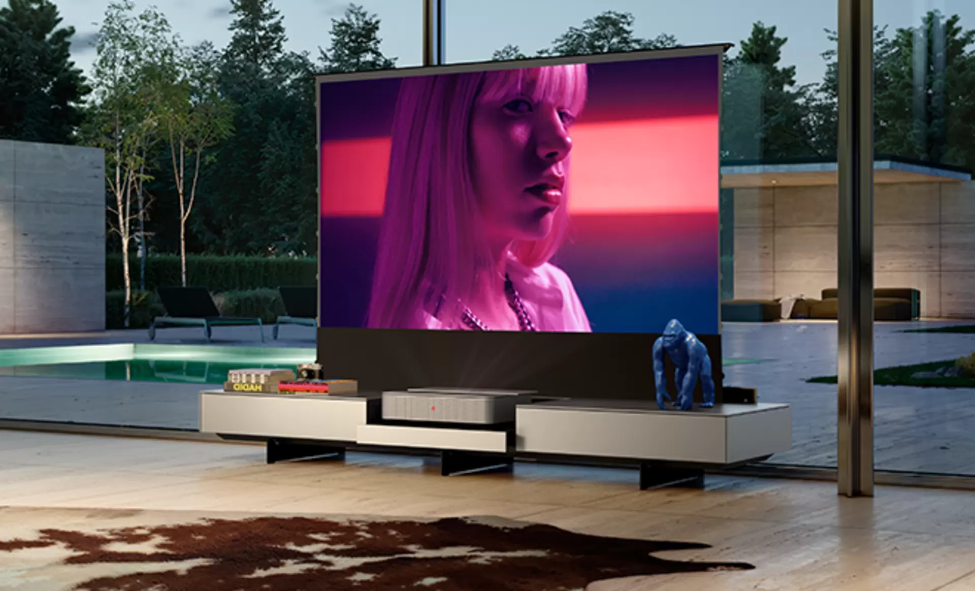 Das Kettnaker Cinema Lowboard der Serie Soma mit Leica Beamer und integrierter ausfahrbarer Leinwand.