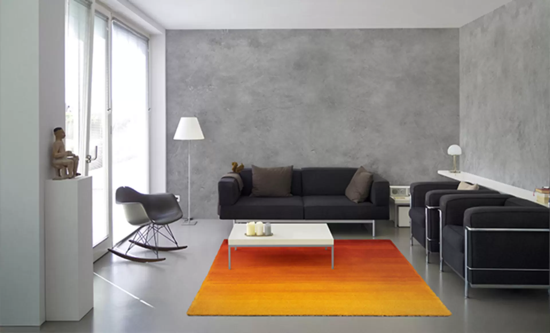 Ein Teppich der Serie Degarde in orange und gelb von der Marke braun collection
