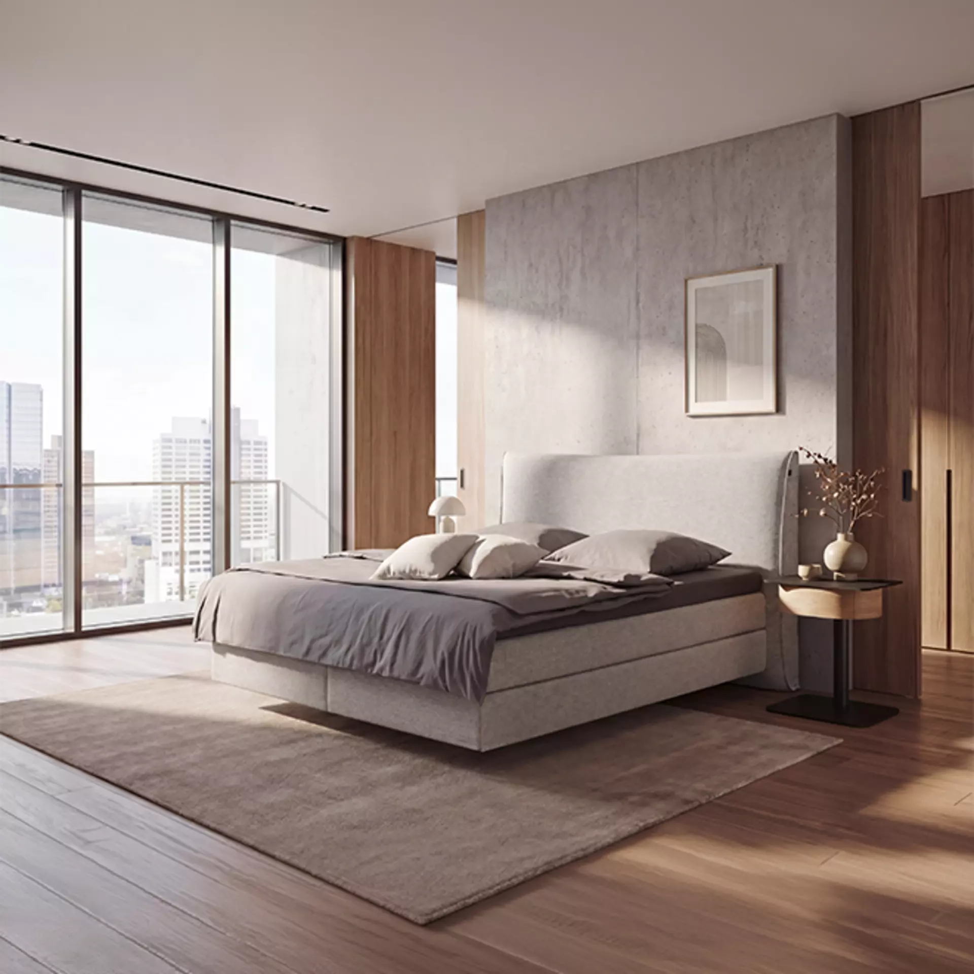Das Hülslta Cuello Boxspringbett in sanftem Beige in einem Schlafzimmer mit großer Fensterfront