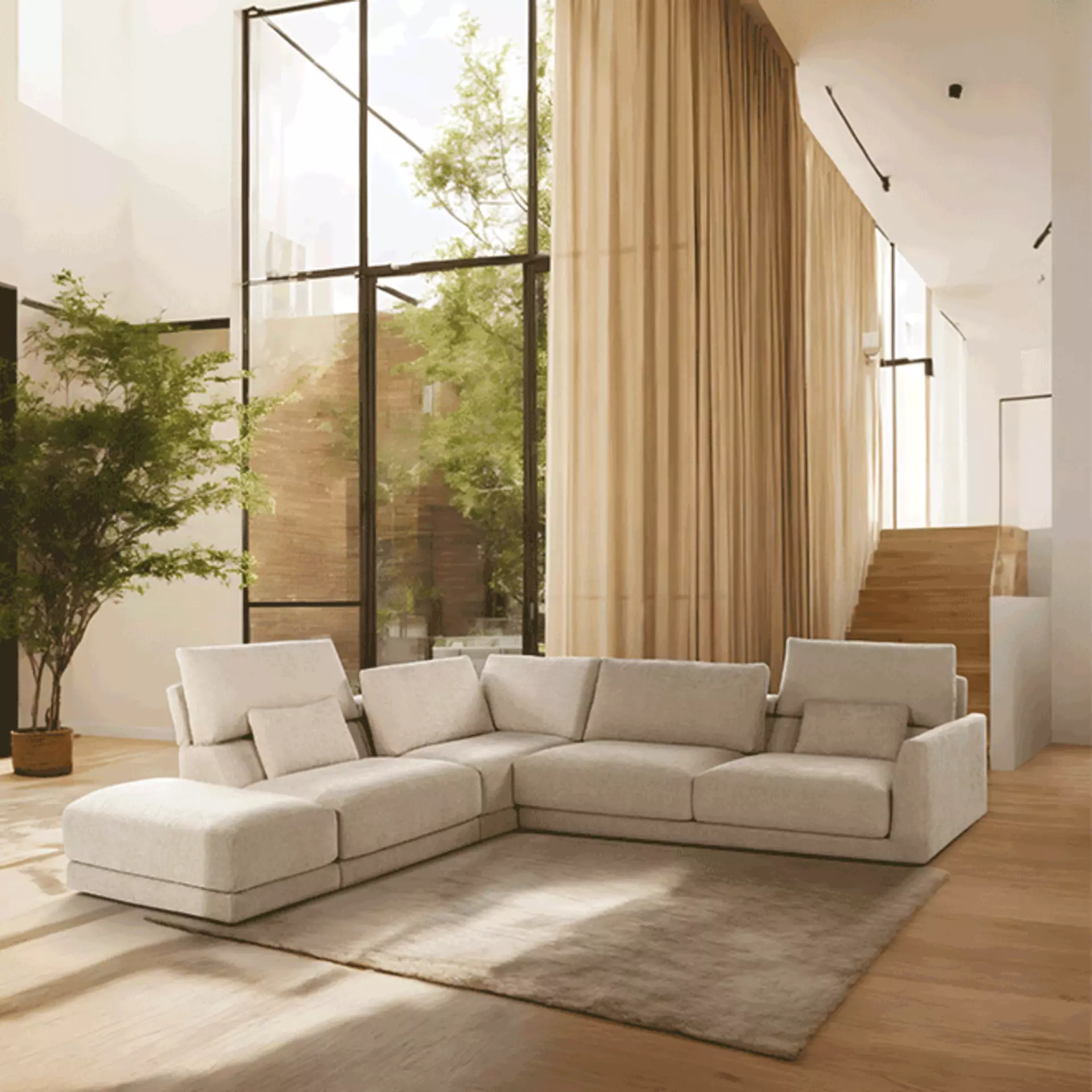 Großes cremefarbenes Ledersofa von Calia Italia in einem lichtdurchfluteten Wohnzimmer mit natürlicher Atmosphäre.