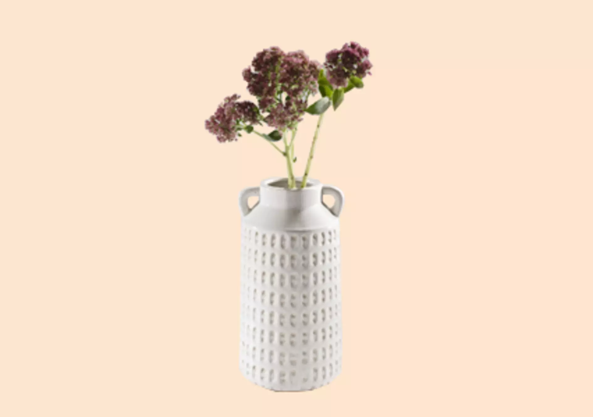 Weiß getöpferte Vasen mit einzelnen Blumen