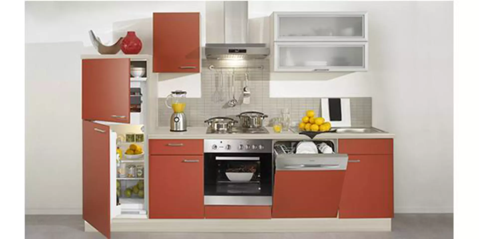 Kleine Küche mit hellroten Fronten und diversen Einbaugeräten dient als Beispiel für Kompaktküchen.