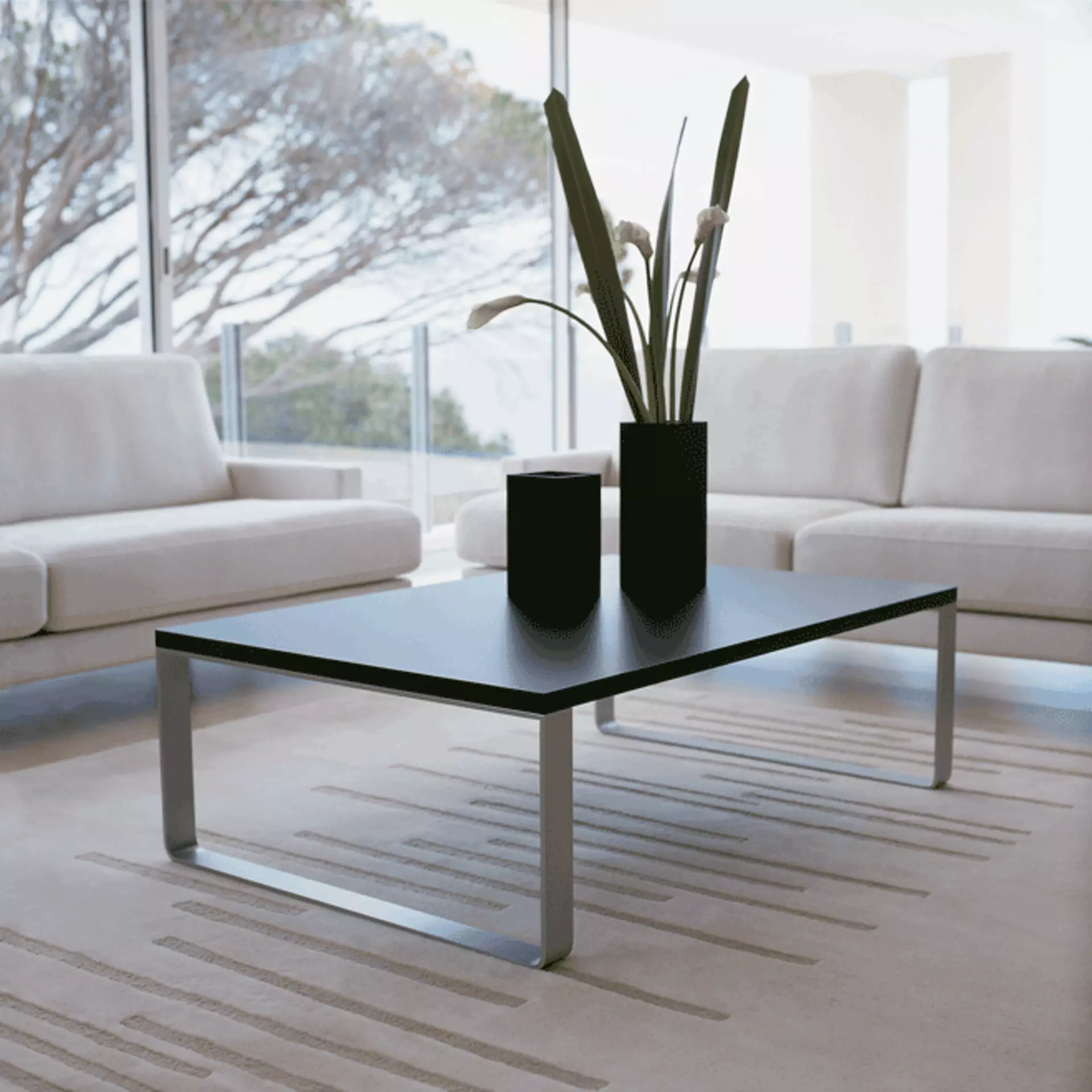 Modernes Wohnzimmer Weiße Couch mit schwarzem Beistelltisch | Möbel Inhofer