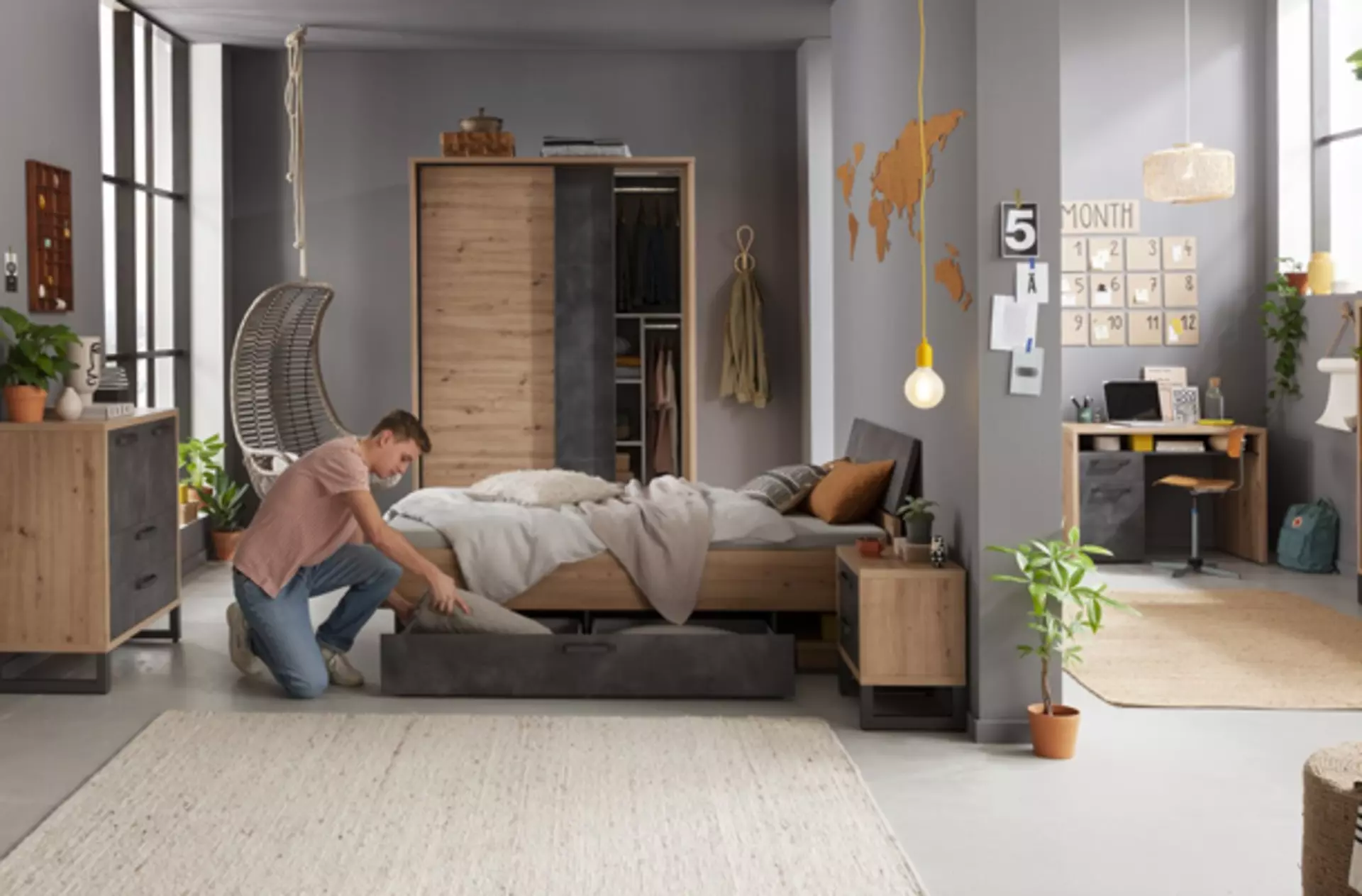 Milieubild zu "Gästezimmer" mit Möbeln in Grau und Holz.