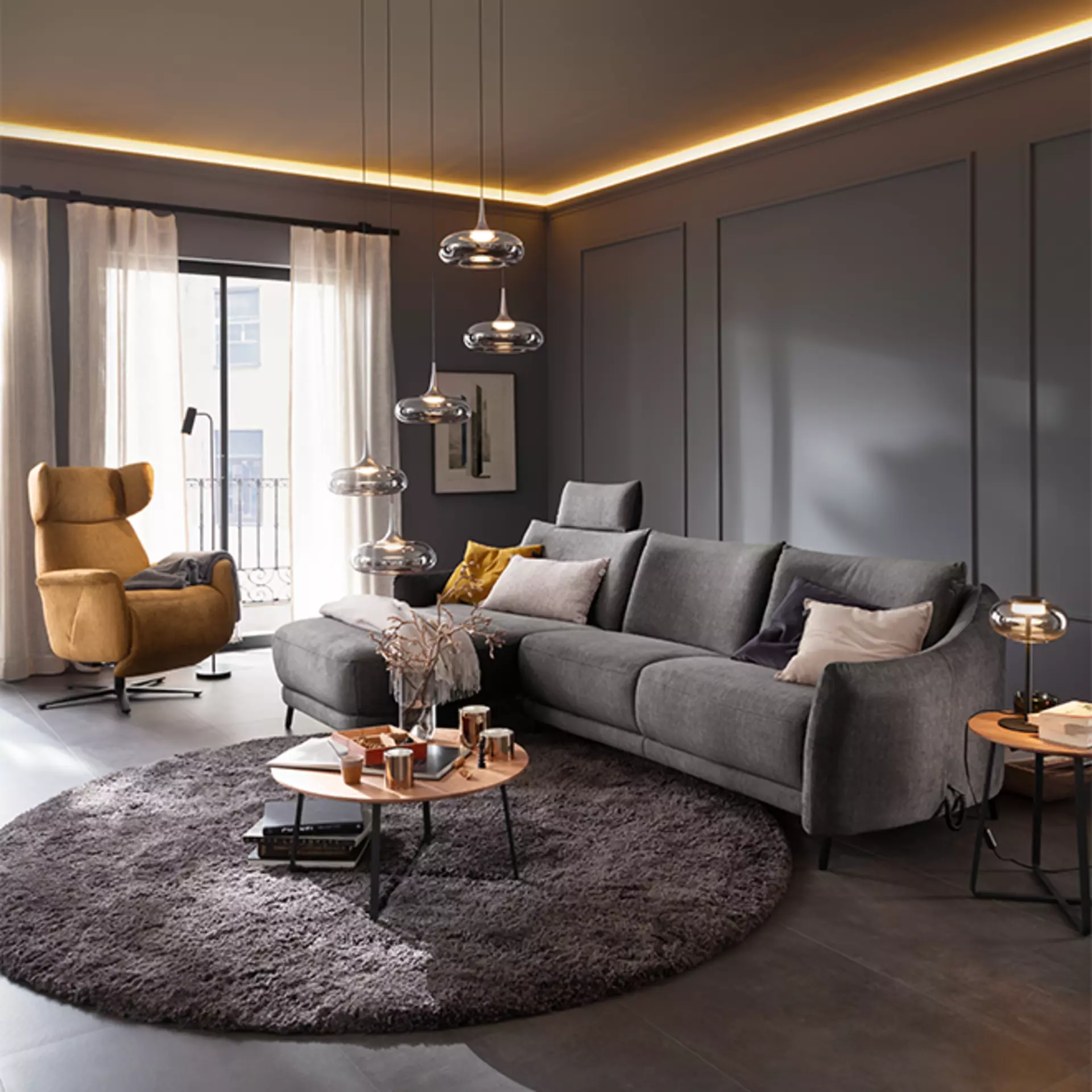 Die Catola Wohnlandschaft der Schöner Wohnen Kollektion in grauem Stoffbezug in einem modernen Wohnzimmer fotografiert