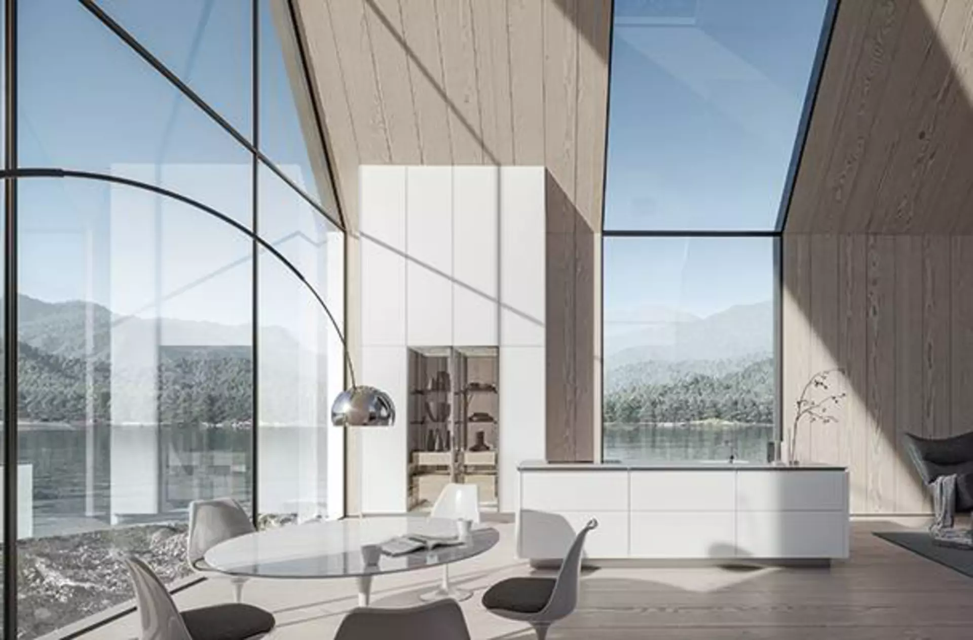 Weiße Kücheninsel und hohe Küchenschränke neben einer  deckenhohen Glasfront ist das Aushängeschild der neuen SieMatic Küche und dient als Kategoriebild für den Premiumbereich First-Class-Küchen.