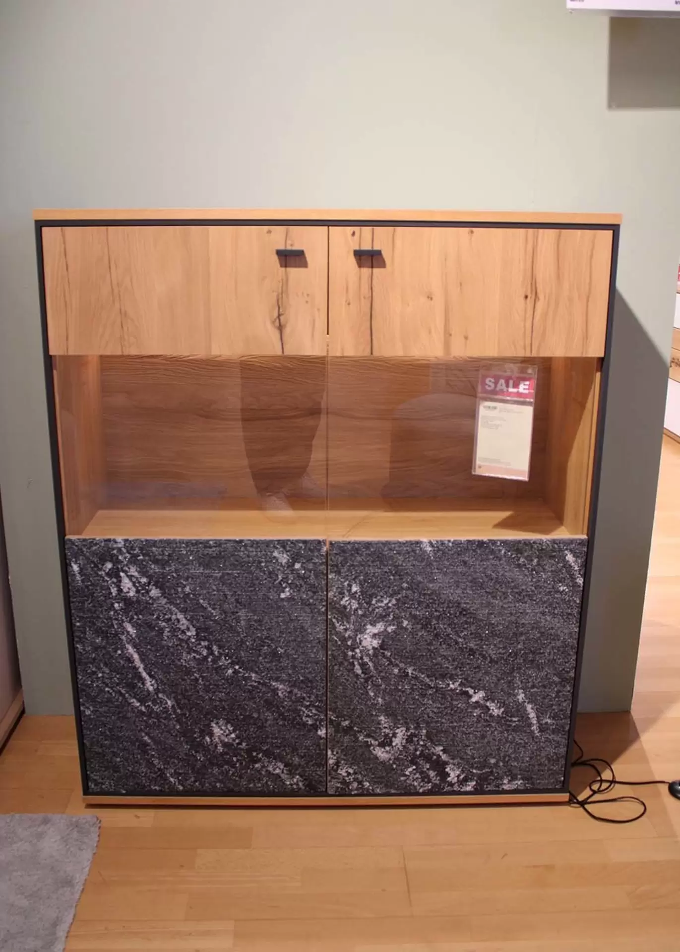 Highboard aus Holz von der Marke Schröder