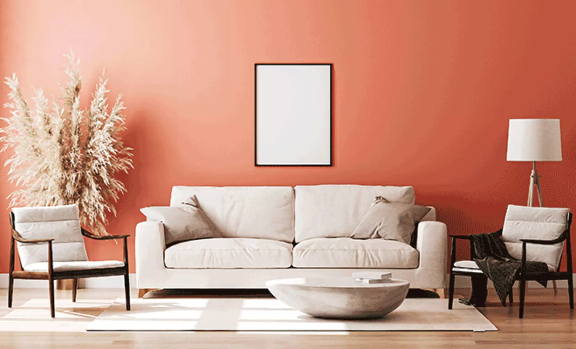 Beige Couch vor orangener Wand - Modernes Wohnzimmer | Möbel Inhofer