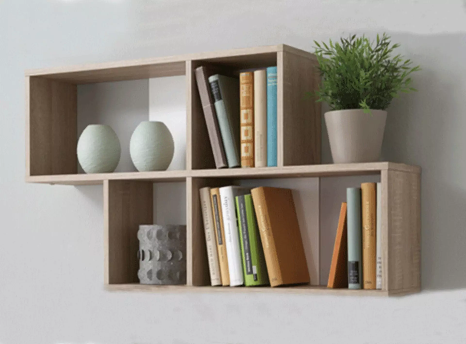 kleines wohnzimmer regal mit schlichter dekoration und büchern